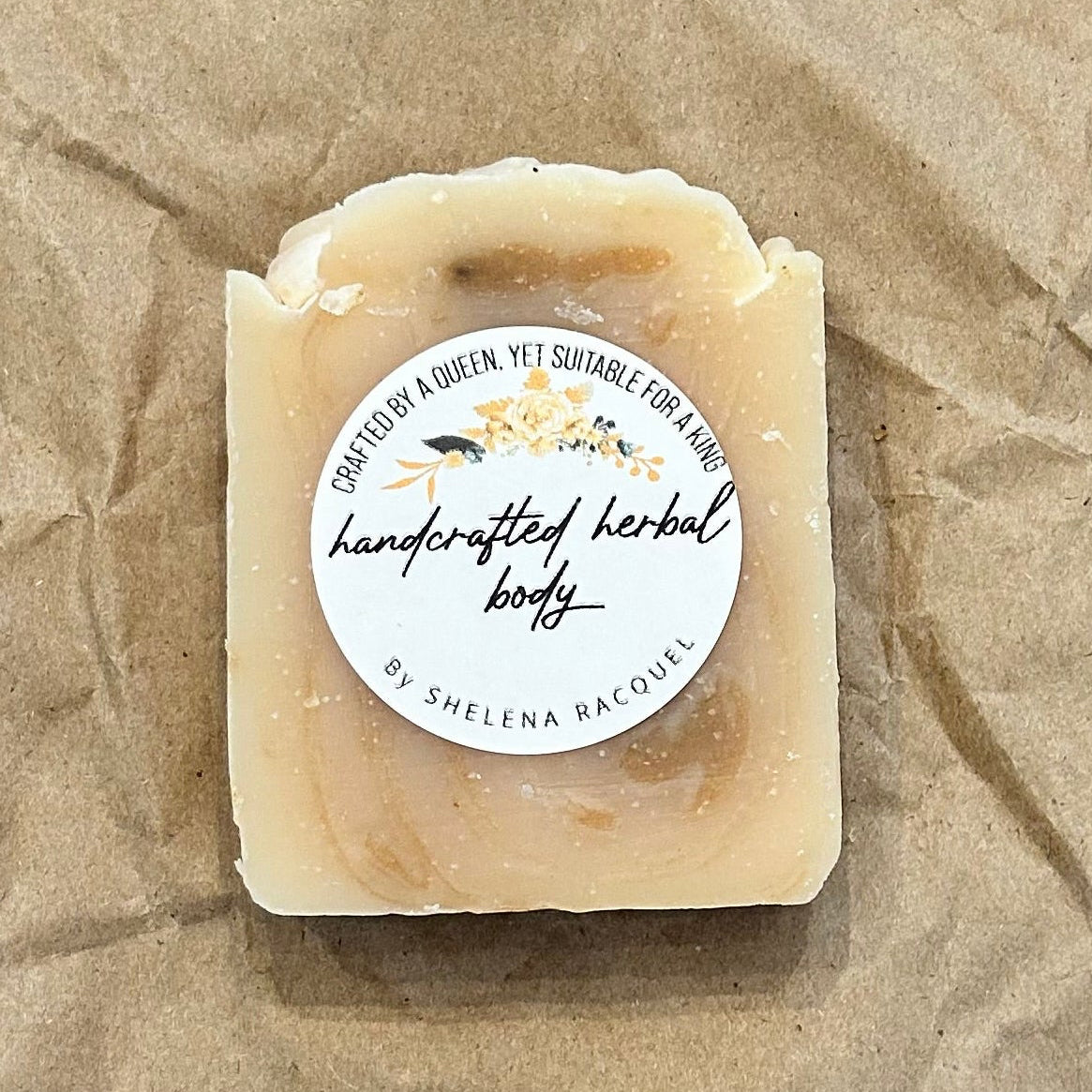 Handcrafted lemon and castor oil soap with lemon peel powder for gentle exfoliation, rich lather, and naturally deodorizing cleansing.